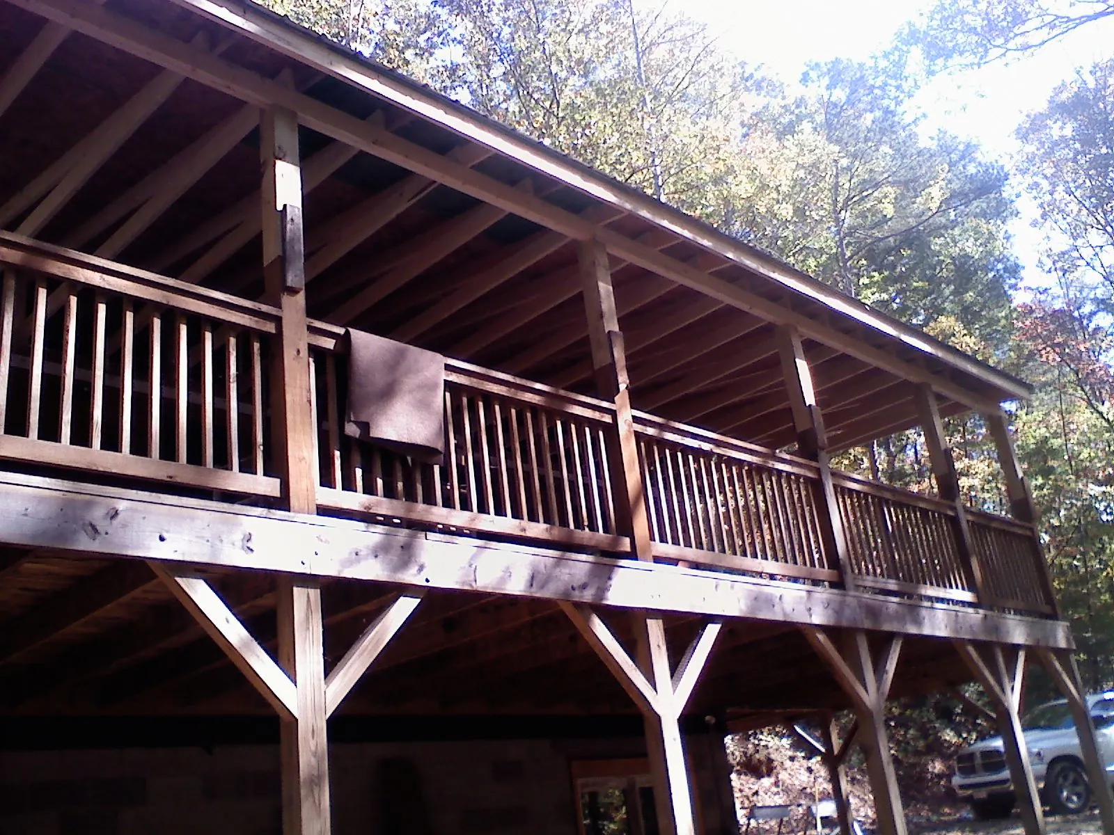 Timber framing under a new elevated porch and deck — Roof Leak Repair in Mappsville by Roofing Brothers